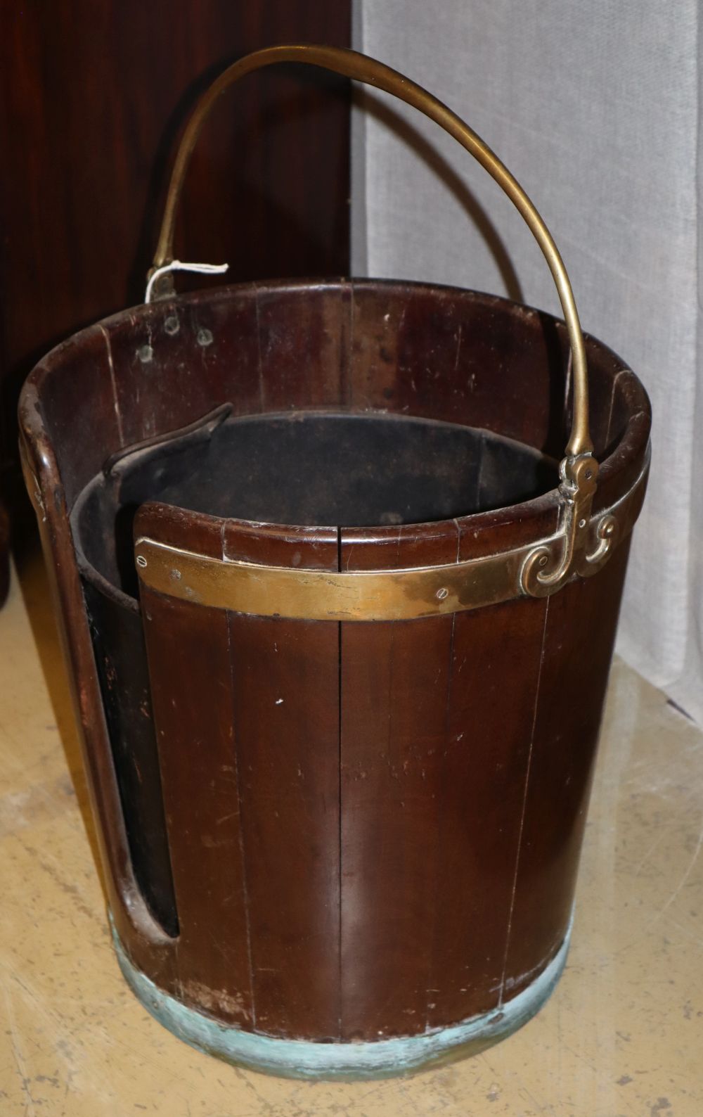 An Irish George III large mahogany plate bucket, brass-bound, 36cm diameter, H.39cm